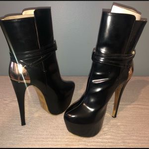 Paper Fox "Kamara" black hi-heel platform boots.